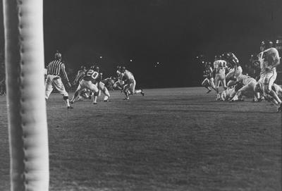Unidentified UK football players during game against unidentified opponent. Photo appears on page 279 in the 1969 Kentuckian