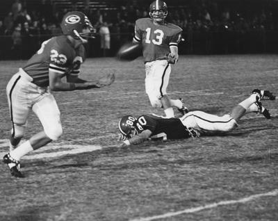 Unidentified Georgia player catching a pass during a game against UK. Photo appears on page 216 in the 1969 Kentuckian