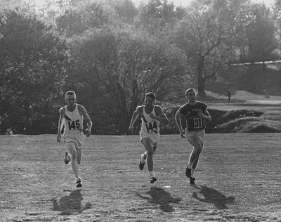 Unidentified members of UK Track team, pictured running on campus