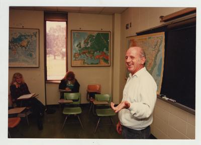 Professor McAninch lectures in a classroom