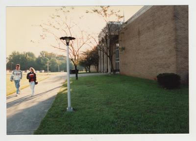 Students walk past Stoner Hall