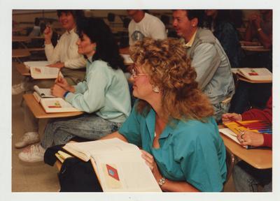 Students listen to a lecture in a classroom