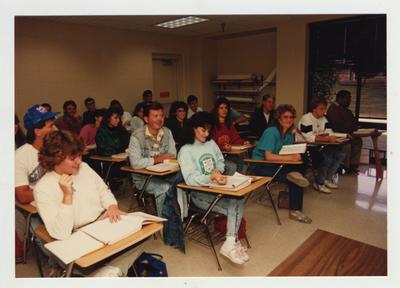Students listen to a lecture in a classroom