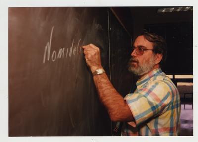 A male professor teaching