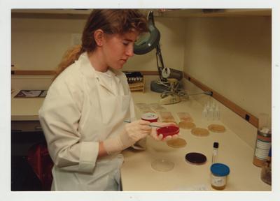 A female student works in a laboratory