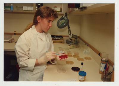 A female student works in a laboratory