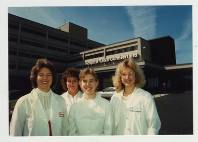 Women stand outside of the Humana Hospital - Lake Cumberland