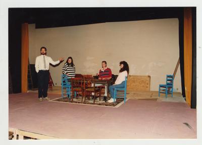 Students act on a stage