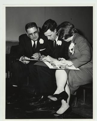George Kavanaugh (left) with an unidentified man and woman