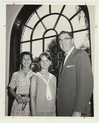Studying at the University High School is Merja Virta Ranta (center) from Helsinki, Finland; With her are Mrs. Carl Wiesel, of Lexington, in whose home Ranta is staying, and professor James Powell, director of the University of Kentucky prep school; This photo appeared in the October 1962 