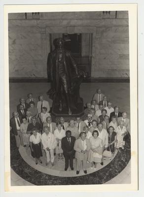 Donovan Scholars, including an unidentified African - American, stand at the Capital Rotunda in Frankfort