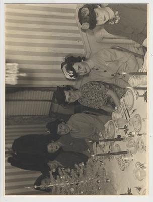 From left to right: Unidentified, Carolyn Reading, Catherine Katterjohn, Jacqueline Bull, Mary Jane Stallcup, Maona F. Shinkle (Mrs. J. C. Eaves), Mrs. Daisy T. Croft