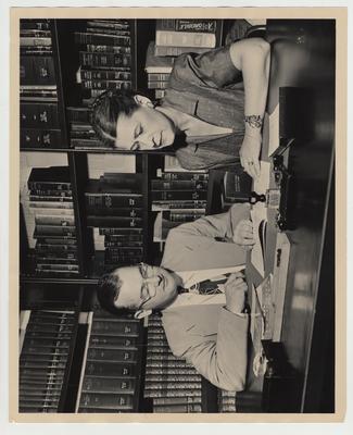 Lawrence S. Thompson and Mrs. Frank Pope in the English Library; Photographer: Ben L. Williams