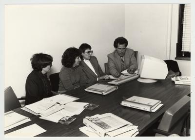 Gail Kennedy (second from left) and Mike Lach sit with two unidentified women; Submitted for use the the 1983 / 1984 annual Report