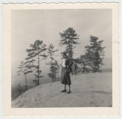 Jacqueline Bull, Director of Special Collections, stands atop a mountain near Montreat, North Carolina