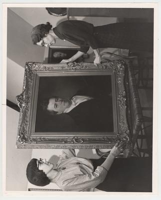 Dr. Jacqueline Bull and Mrs. Margaret Torp, with a portrait of John White Stevenson