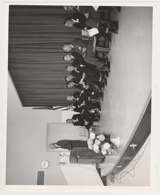 Medical Center dedication; From left: Dr. Willard (speaking), Congressman John Fogarty, two unidentified, Harold L. Hillenbrand, Paul Blazer, Governor Combs, President Frank Dickey, unidentified, Dr. Raymond E. Meyers (University of Louisville Dean), and Dr. Albright