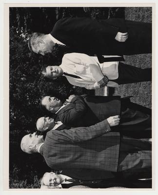 Former President Herman Donovan (far left, wearing glasses), Dean William Willard (left), unidentified, former Governor A. B. 