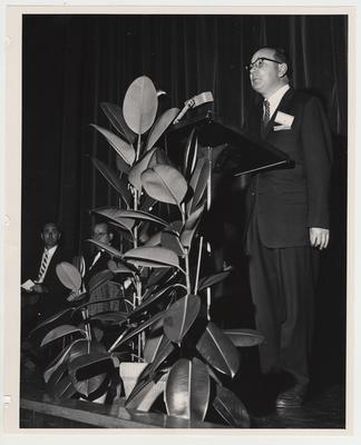 An unidentified man speaks at the Medical Center dedication