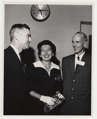 President Frank Dickey (left), Dean William Willard (right), and an unidentified woman converse during the Medical Center dedication
