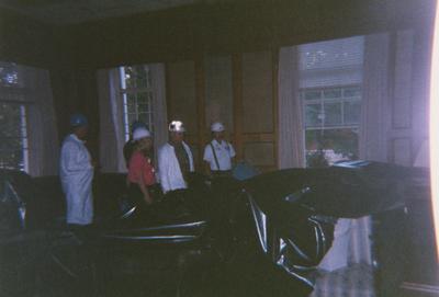 Administration Building fire, May 15, 2001; President's office; Terry Birdwhistell, University Archives (blue helmet) and Peggy Way, President's Administrative Aide