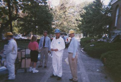 Administration Building fire, May 15, 2001; left to right, Tom Rosko, University Records Manager, Peggy Way, President's Administrative Aide, Dall Clark, Procurement and Construction, Terry Birdwhistell, University Archivist, and Bill Marshall, Director of Special Collections and Archives