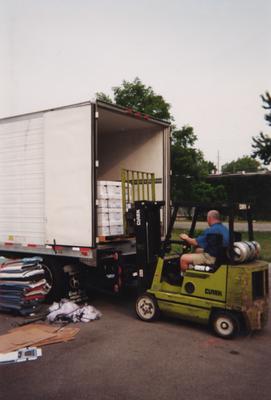 Administration Building fire, May 15, 2001; unidentified man unloads records returned from Munters Corp. Recovery company at the temporary housing at Upper and Pine Streets