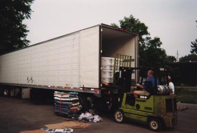 Administration Building fire, May 15, 2001; unidentified man unloads records returned from Munters Corp. Recovery company at the temporary housing at Upper and Pine Streets