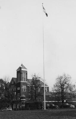 Flag pole in front of Barker Hall