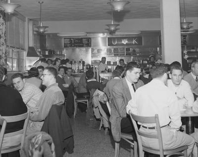 Until the mid-1960's, the Student Union Grill, shown here in 1955, was the campus gathering place; the grill was located in the basement of the Student Union