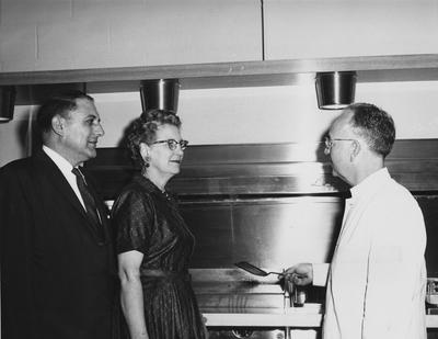 New UK Grill, located in the old football locker room near Donovan and Haggin Halls; pictured left to right are George R. Kavanaugh, associate business manager, Marie Fortenberry, Director of Food Services, and Lawrence Roberts, manager of the new grill; Public Relations photo