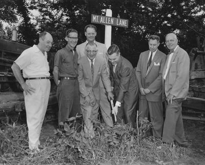 Mayor Harry B. Schnecler and President Frank Dickey, break ground for Northern Center building. Also present are Covington Commissioners Robert Northcut and Ray Vehrman, City Manager Oscar Hesch, Commissioner Bernard Eichholz and George Ankenbauer. Received June 13, 1959 from Cincinnati Enquirer. Photographer: Howard Pille