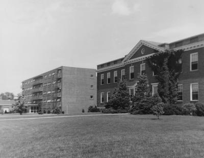 Thomas Poe Cooper Building (right) which now houses the Forestry Department. Received June 16, 1958 from the Public Relations