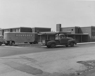 Truck of furniture being delivered to Cooperstown Apartments