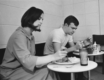 Two unidentified students are eating breakfast in the Dillard House. This photo is first on page 207 of the 1969 