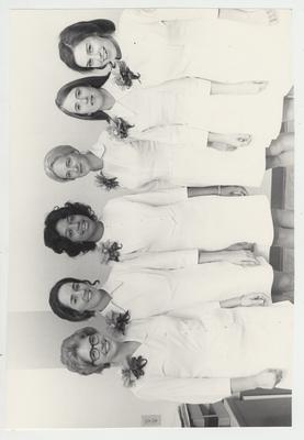 Six nurses with flowers
