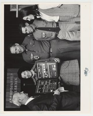 Dr. Walton and James E. Tolson (third from right) with unidentified others