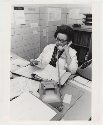 Mrs. E. Chapman, of Equipment Services, on the telephone