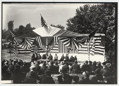 University of Kentucky military training during World War I.  On stage ceremony, president Frank L. McVey is seated on stage