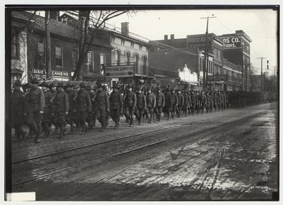 University of Kentucky military training during World War I.  Cadets marching down Main Street