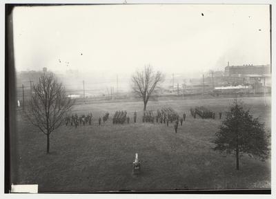 University of Kentucky military technical training during World War I.  Cadets in from of the Administration cannon