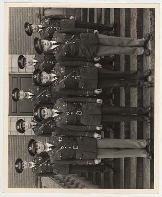 February 1941 senior cadets.  Front row from left: Major J. P. Rose, Captain C. L. Elmore*, Captain B. F. Van Sant*, and Captain J. C. Doerr.  Back row from left: First Lieutenant M. B. Naff, First Lieutenant Stanley Penna*, First Lieutenant G. C. Cardwell, First Lieutenant C. B. Williamson, and First Lieutenant P. J. Cavise.  * denotes World War II Gold Start List.  This image is in the 1941 Kentuckian on page 248
