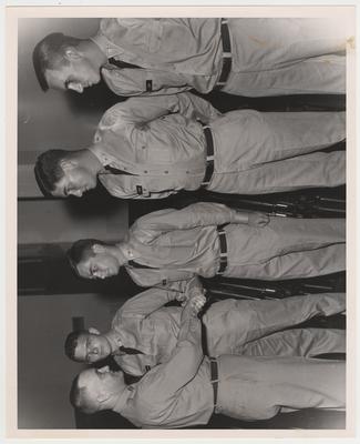 University of Kentucky students in uniform with Sergeant Hedges.  From the left: Sergeant Hedges, Davis, J. T. Holt, Dixon, and Luby
