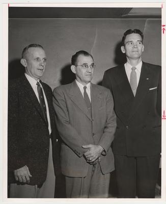 Three unidentified men