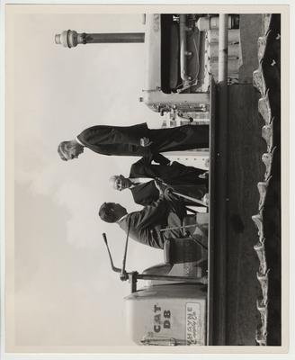 From left to right: Robert Matthews, Frank Peterson and Frank Dickey visiting the future site of the Agriculture Research Center