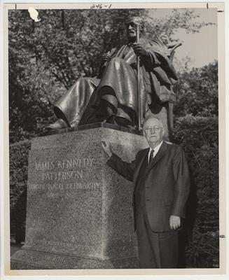 Doctor Donovan standing beside the statue or monument to President James K. Patterson near the Administration building.  This photo is in the 1963 Kentuckian on page 246