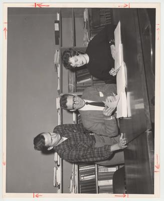 Dean Albert Kirwan (center) of the Graduate School with two students