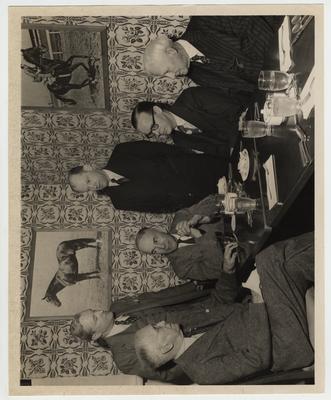 A luncheon for Archibald MacLeish.  From left to right: Frank L. McVey; Professor Grant C. Knight; Archibald MacLeish; Doctor Herman Spivey; A. B. Guthrie, Junior; Doctor L. L. Dantzler