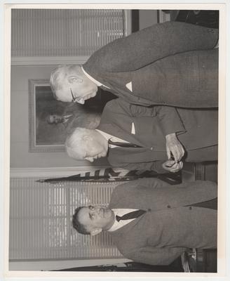 Stephen Watkins Foundation sets up a civil engineering fellowship on March 3, 1962.  Standing left to right in front of a portrait of former president Frank Dickey are: President John Oswald, J. Stephen Watkins, and Robert Ezekiel Shaver, Dean of Engineering