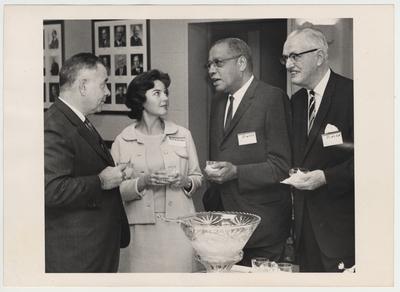 From left to right: President John Oswald, Ms. McKirachan, Mr. Atwood, and Mr. Paul Blazer at a reception